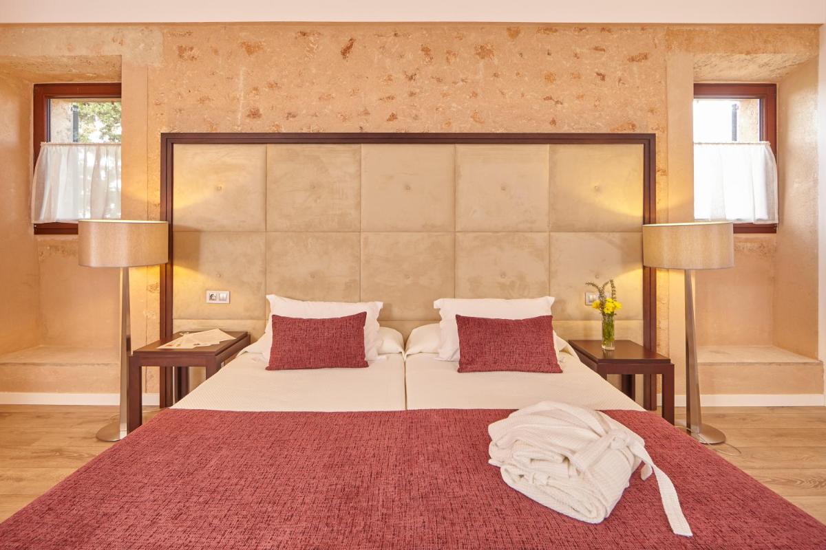 Cama o camas de una habitación en Bennoc Petit Hotel - Only Adults