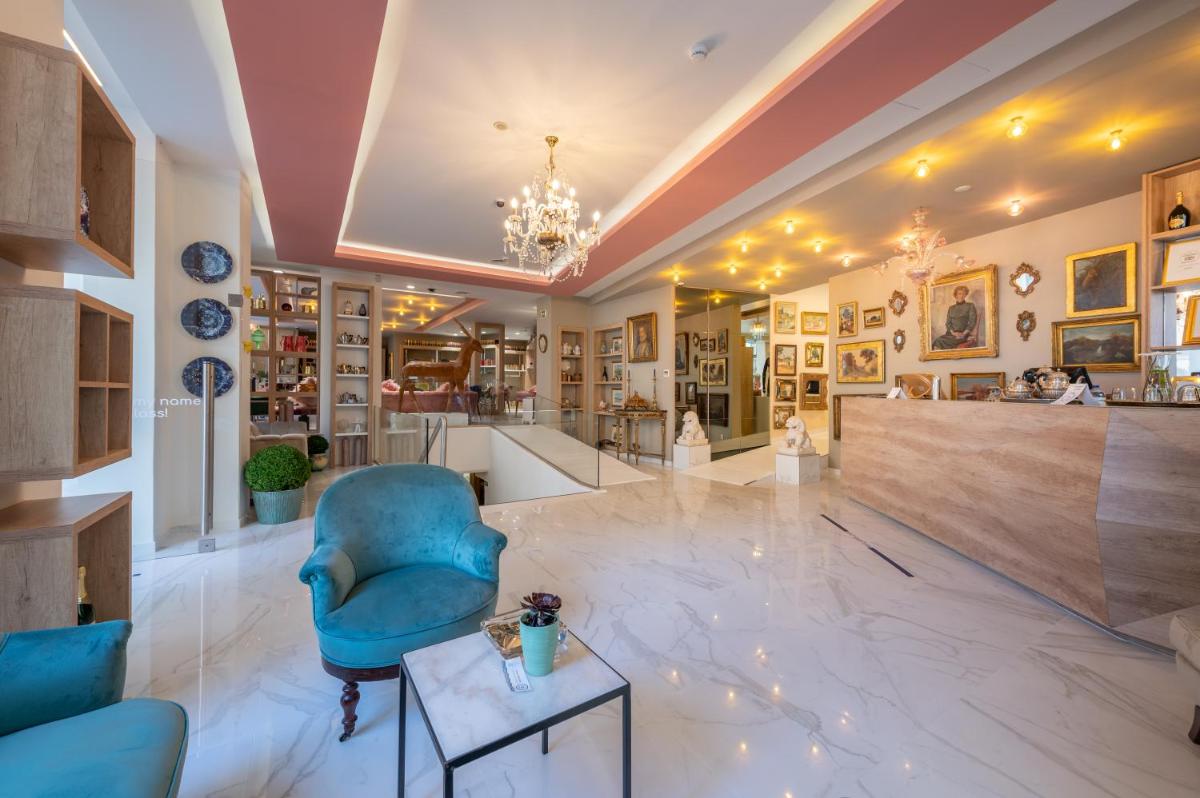 Uma área de estar em Sé Boutique Hotel