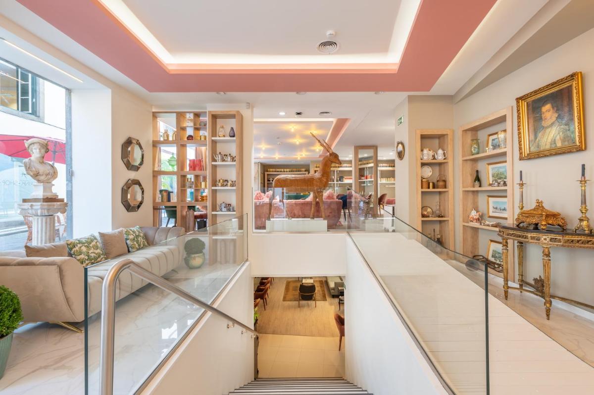 Uma área de estar em Sé Boutique Hotel