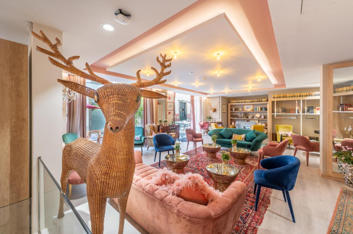 Uma área de estar em Sé Boutique Hotel