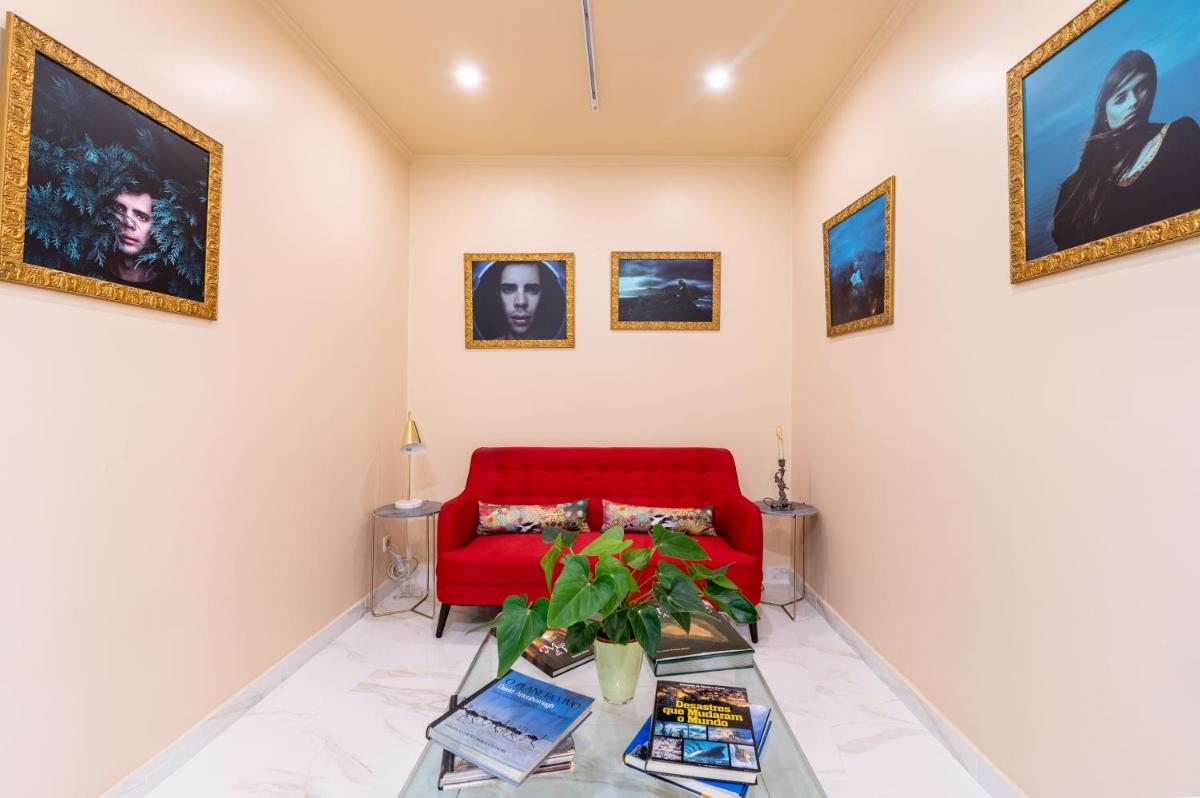 Uma área de estar em Sé Boutique Hotel