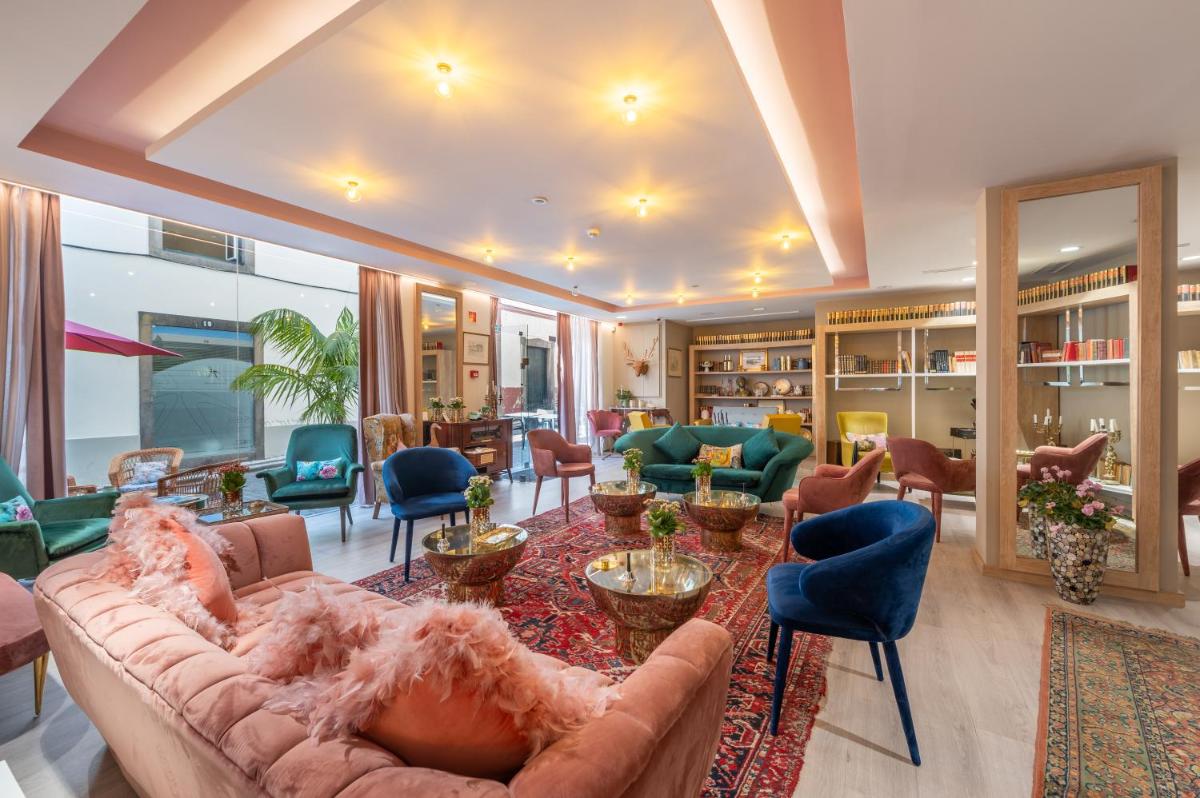 Uma área de estar em Sé Boutique Hotel