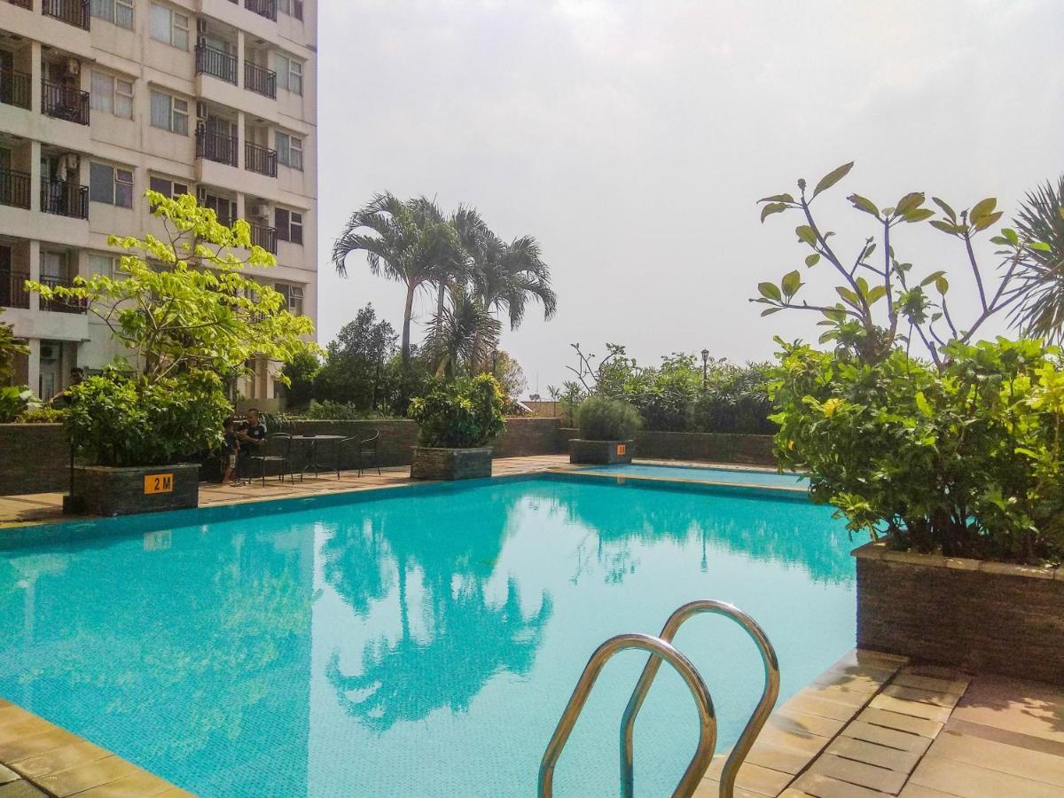 Good Homey and Simply Studio Margonda Residence 3 Apartment By Travelio - Housity