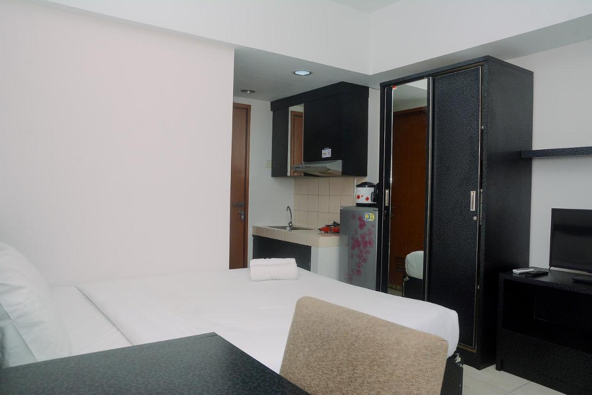 Good Homey and Simply Studio Margonda Residence 3 Apartment By Travelio - Housity