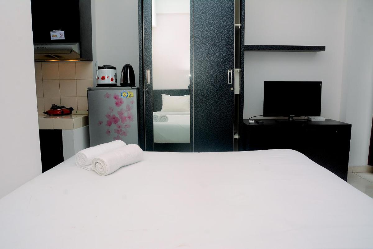Good Homey and Simply Studio Margonda Residence 3 Apartment By Travelio - Housity
