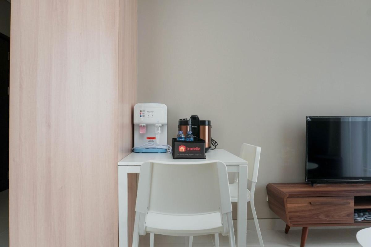 Lavish 1BR at Ciputra International Apartment By Travelio - Housity