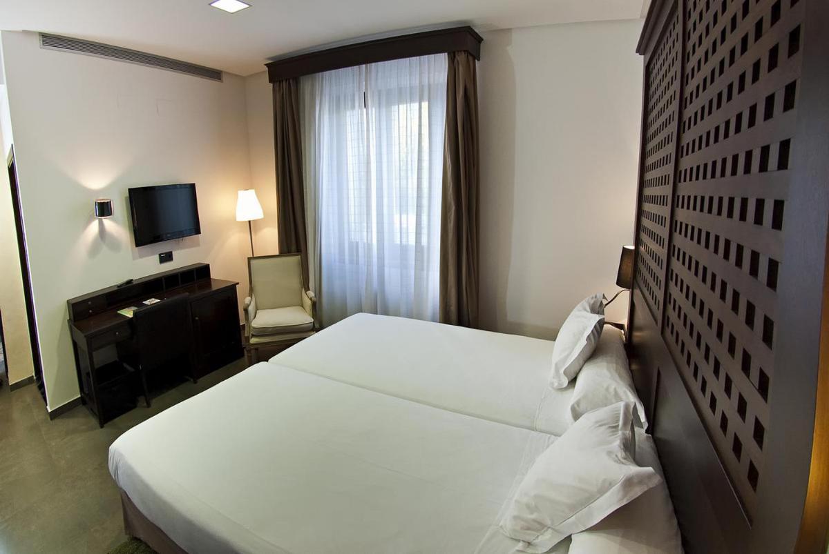 Cama o camas de una habitación en Hotel Convento Aracena & SPA