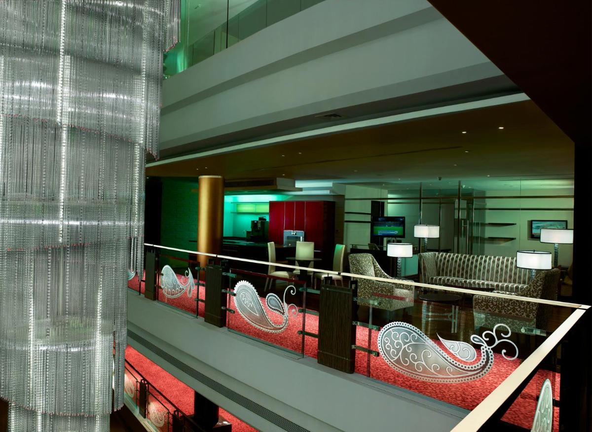 a lobby of a hotel with a waiting room at Sofitel Mumbai BKC in Mumbai