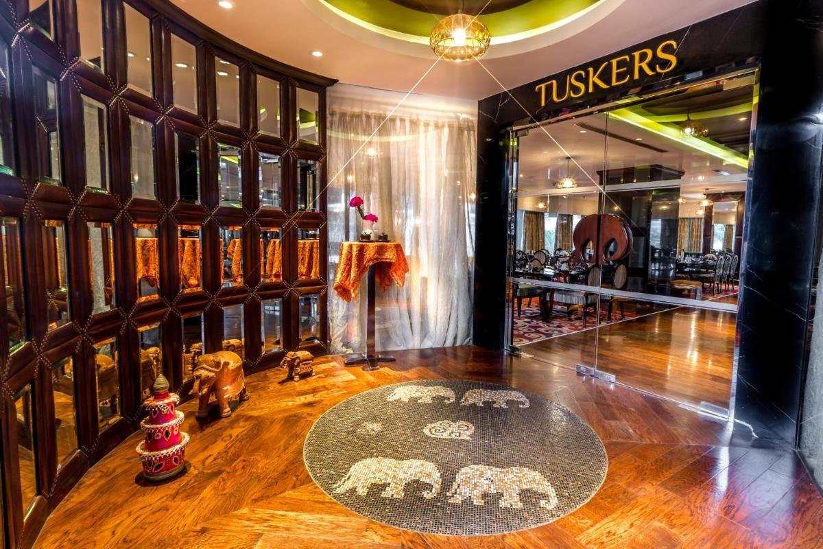 a dressing room with a table in front of a store at Sofitel Mumbai BKC in Mumbai