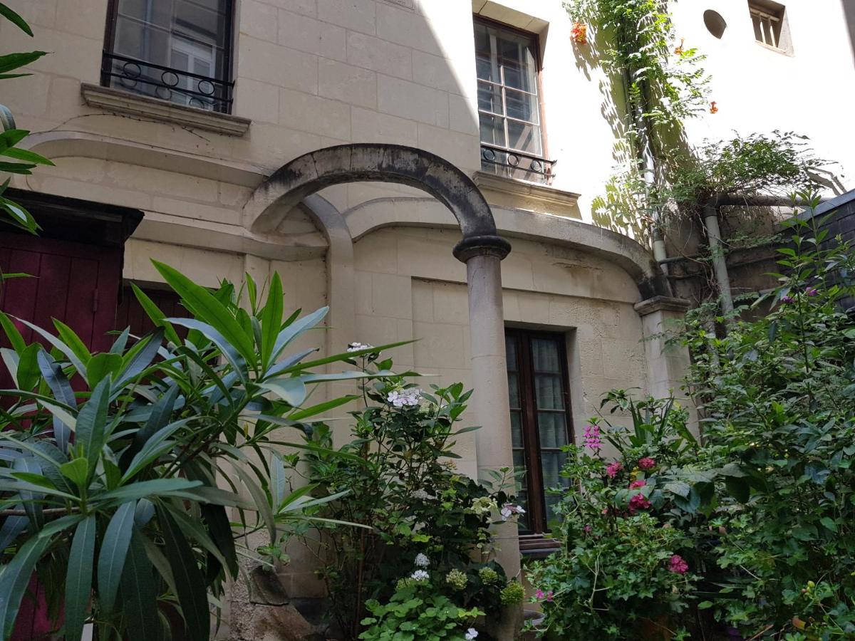 Maisonnette atypique en triplex au calme hyper-centre place du Ralliement - Housity