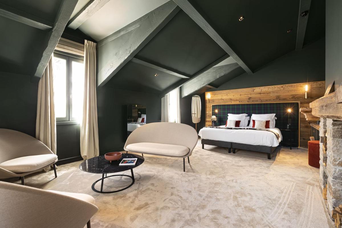 Un ou plusieurs lits dans un hébergement de l'établissement Hotel Le Chabichou