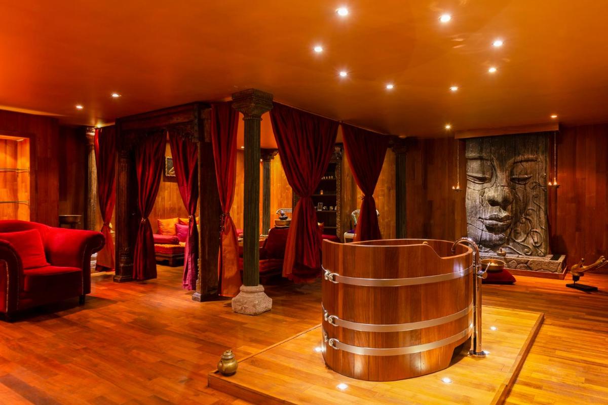 Coin salon dans l'établissement Hôtel Macchi Restaurant & Spa
