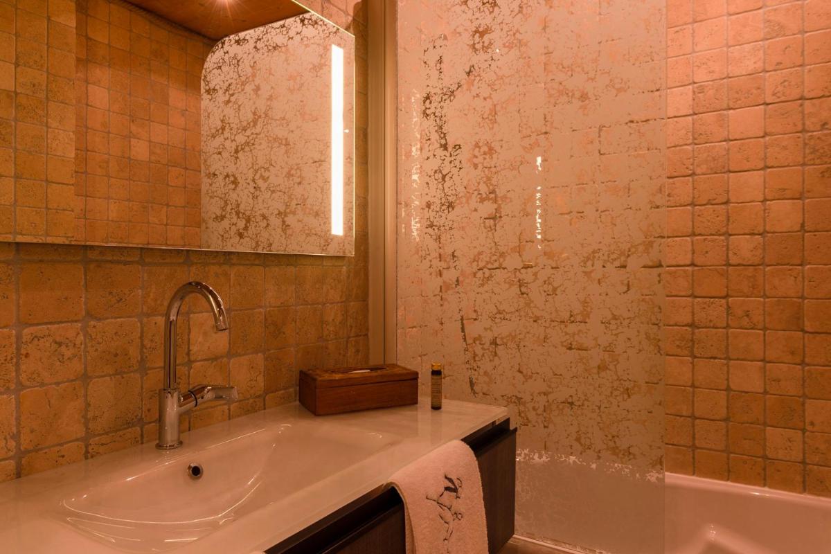 Salle de bains dans l'établissement Hôtel Macchi Restaurant & Spa