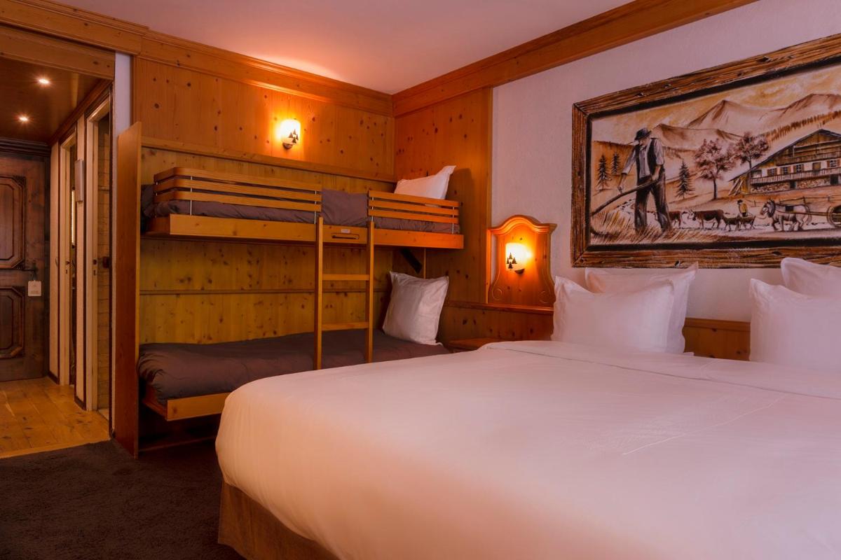 Un ou plusieurs lits dans un hébergement de l'établissement Hôtel Macchi Restaurant & Spa