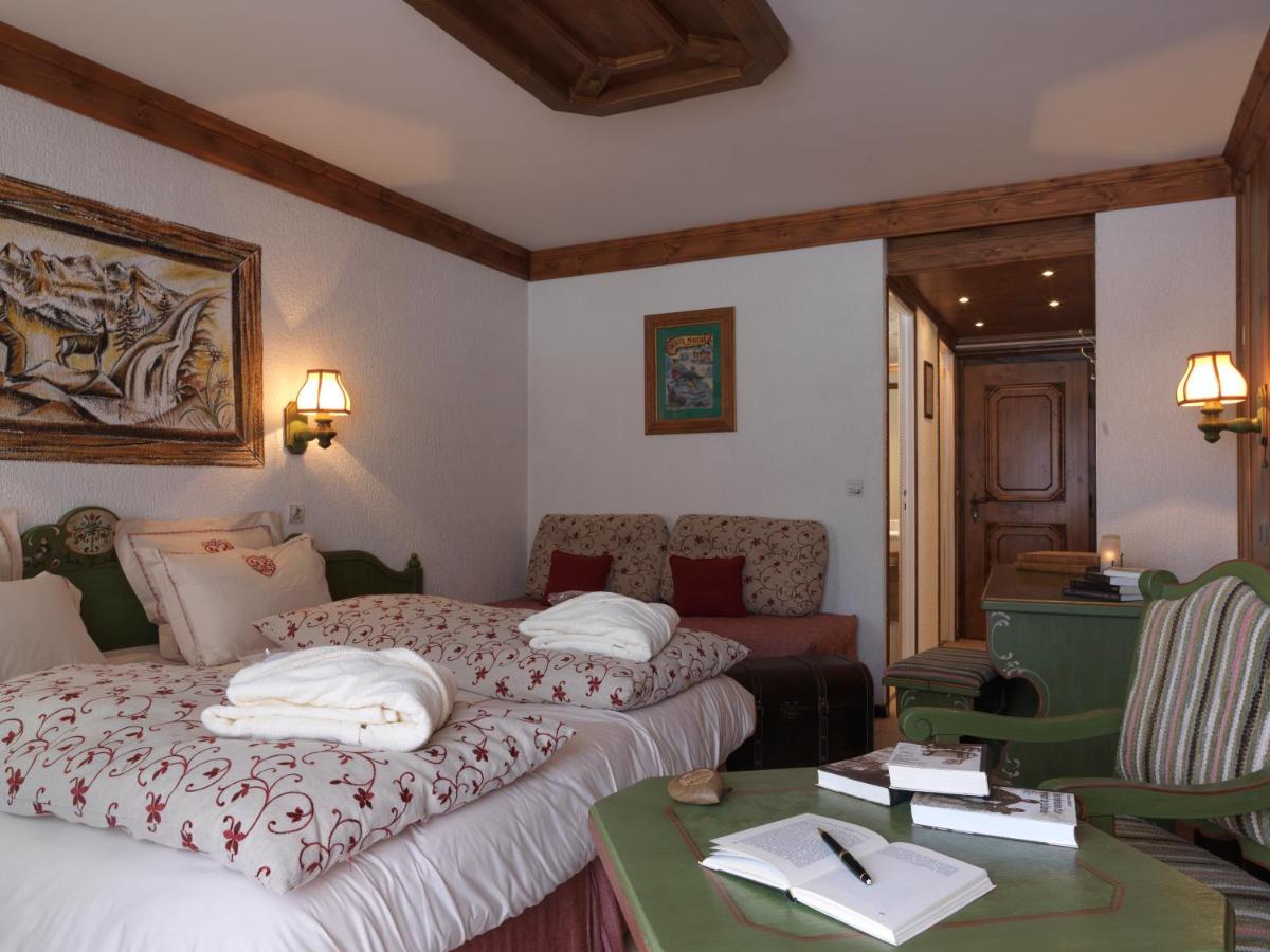 Un ou plusieurs lits dans un hébergement de l'établissement Hôtel Macchi Restaurant & Spa