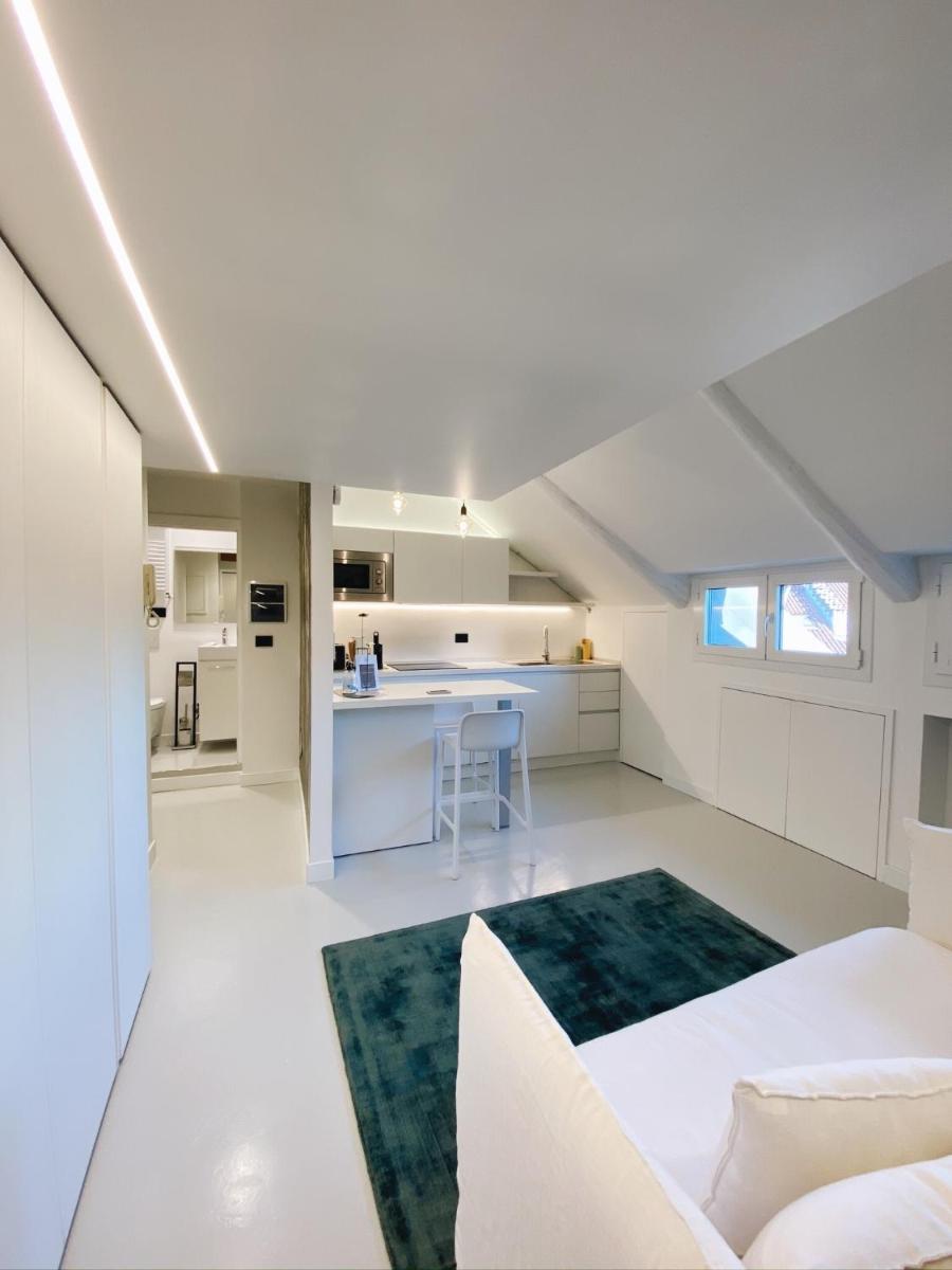 Mansarda in Bianco by Wonderful Italy - Housity