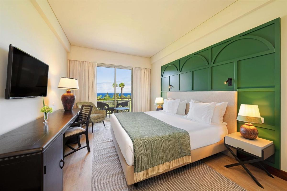 Uma cama ou camas num quarto em Terceira Mar Hotel
