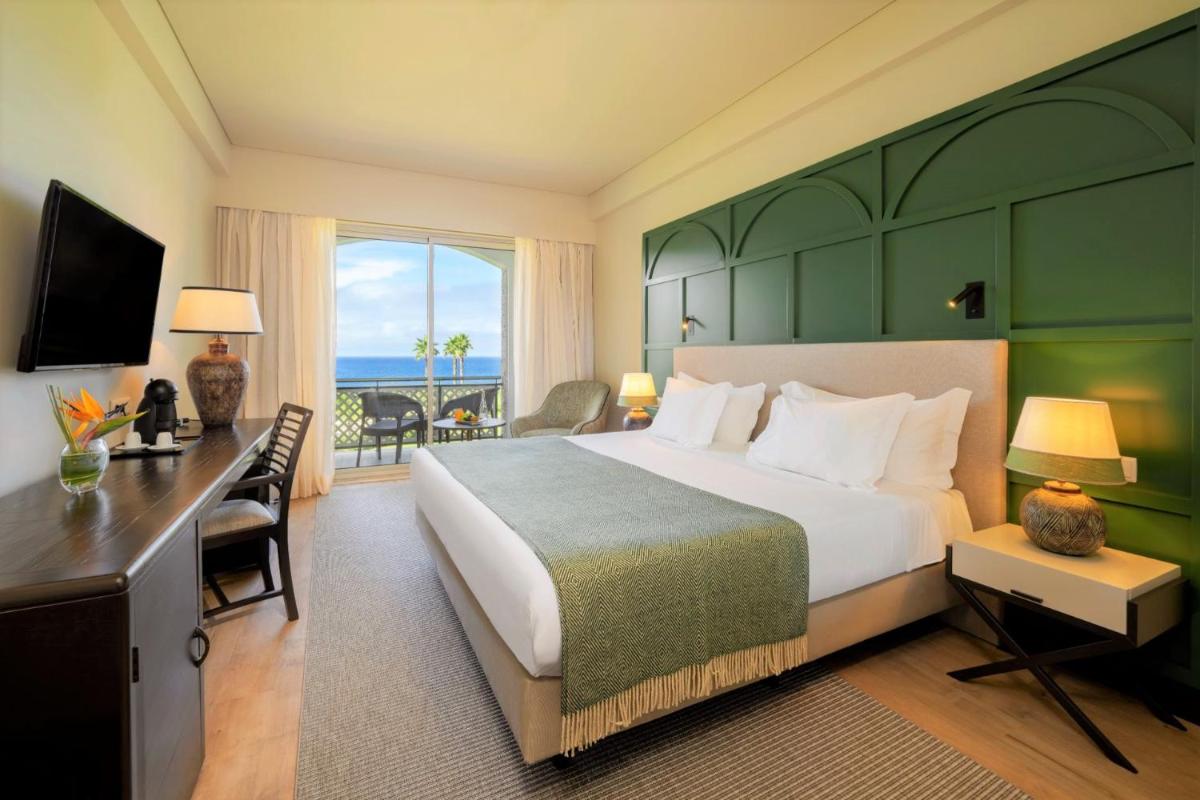 Uma cama ou camas num quarto em Terceira Mar Hotel