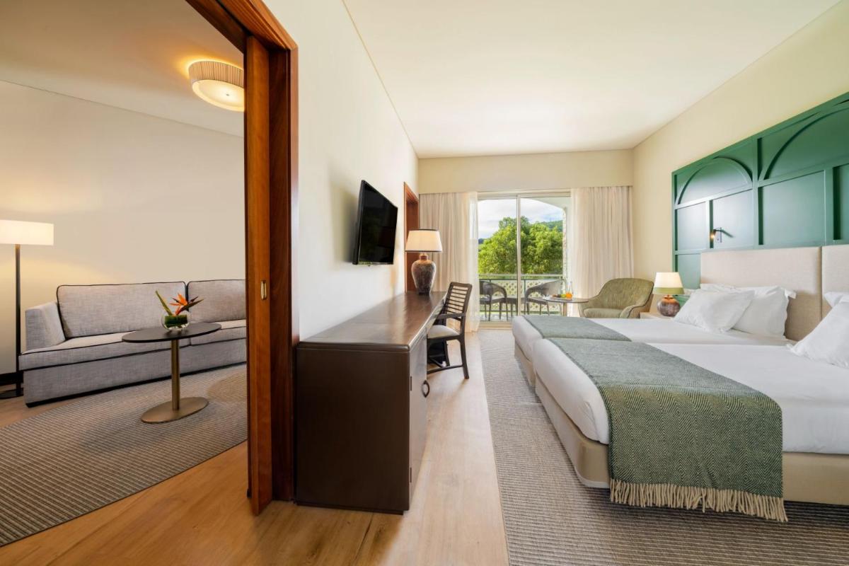 Uma cama ou camas num quarto em Terceira Mar Hotel