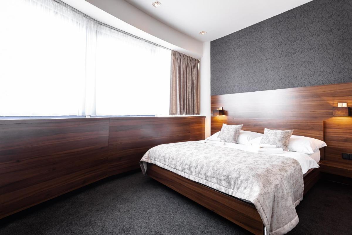 Suitetrails - Tempus Club Garni Hotel