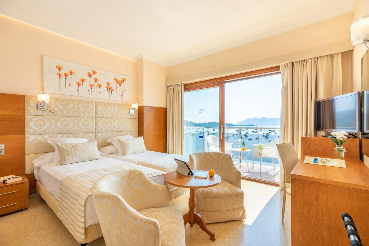 Una televisión o centro de entretenimiento en Hotel Miramar Mallorca