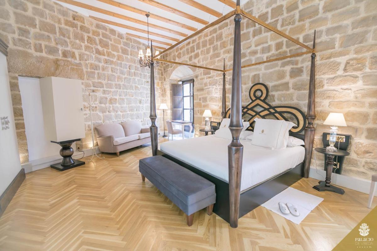 Cama o camas de una habitación en Hotel Palacio De Úbeda 5 G.L