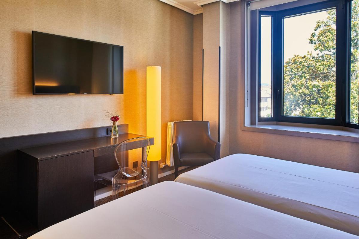 Cama o camas de una habitación en Silken Gran hotel Durango