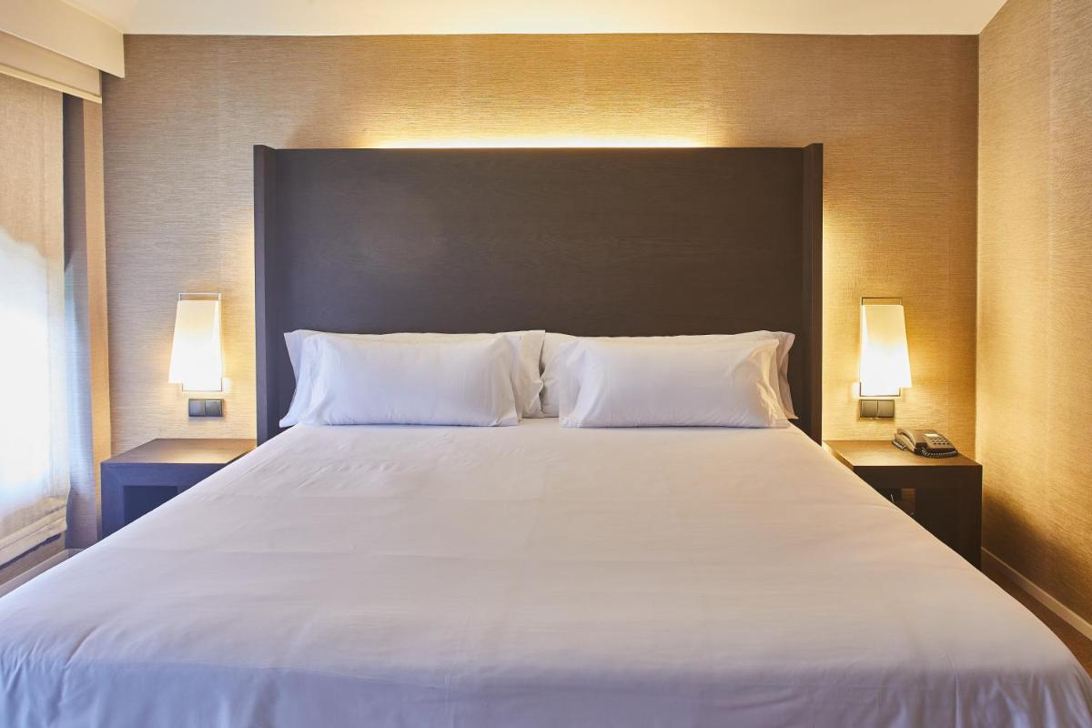 Cama o camas de una habitación en Silken Gran hotel Durango