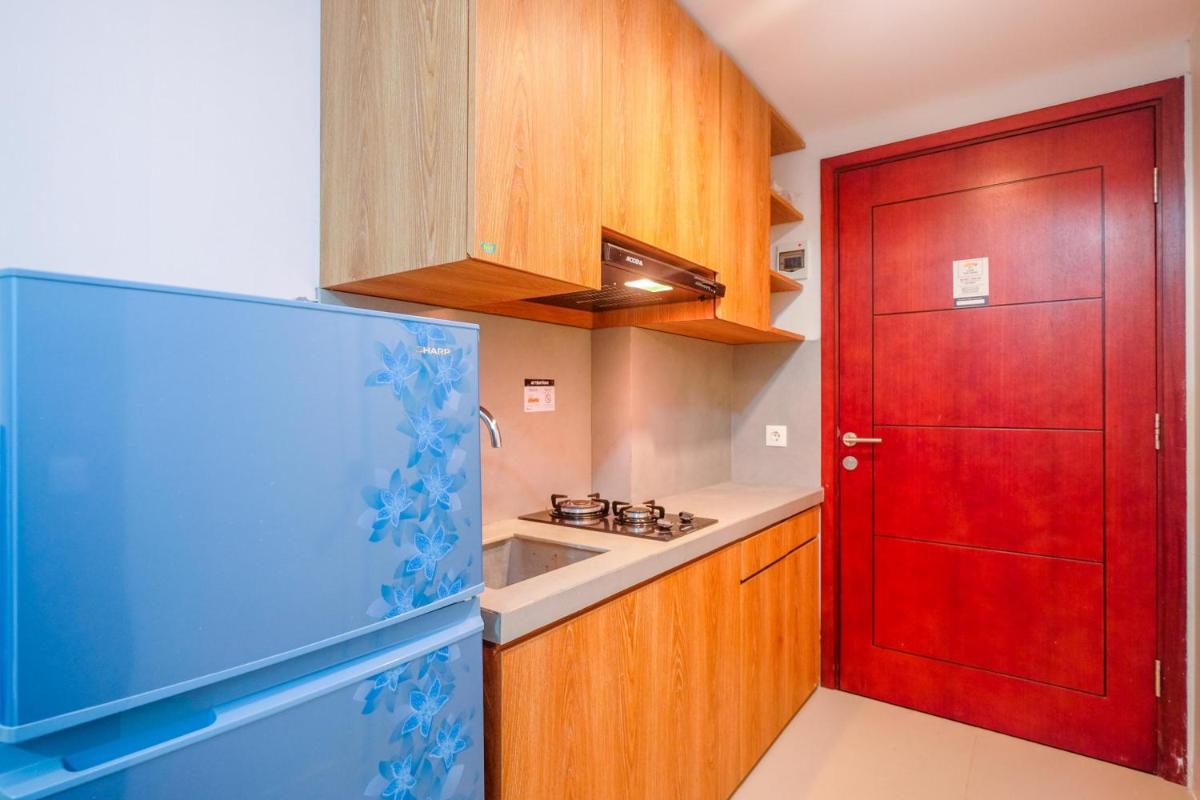 Simply Look Studio Tamansari Mahogany Karawang Apartment By Travelio - Housity