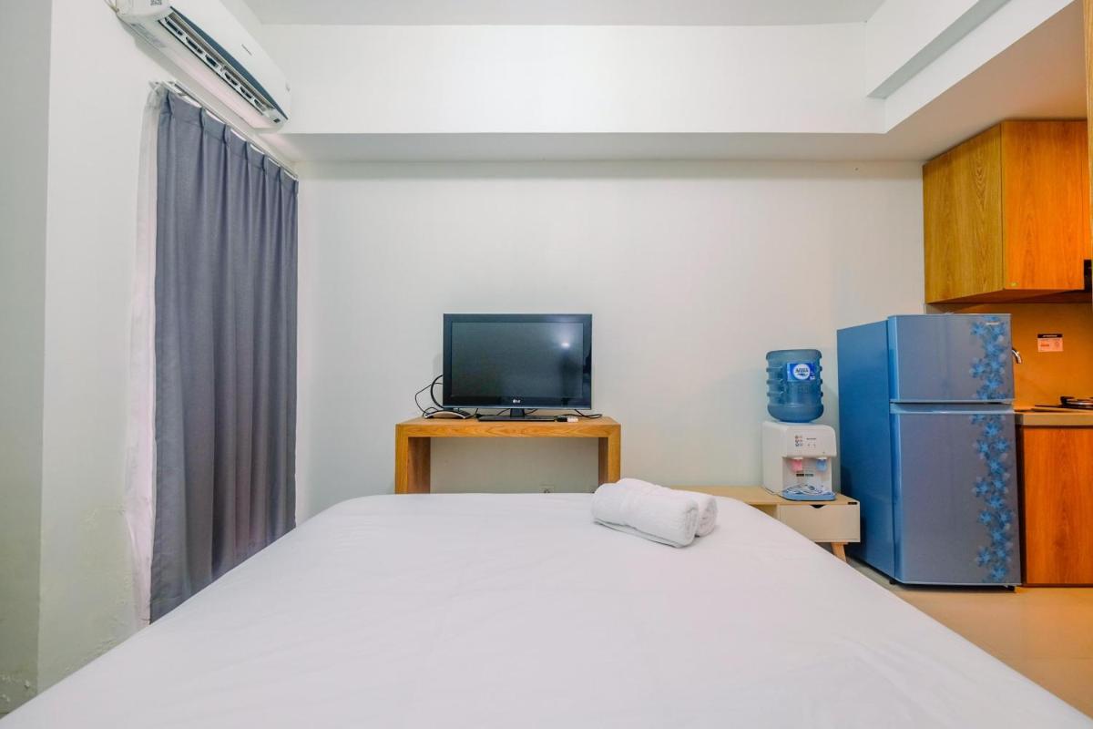 Simply Look Studio Tamansari Mahogany Karawang Apartment By Travelio - Housity
