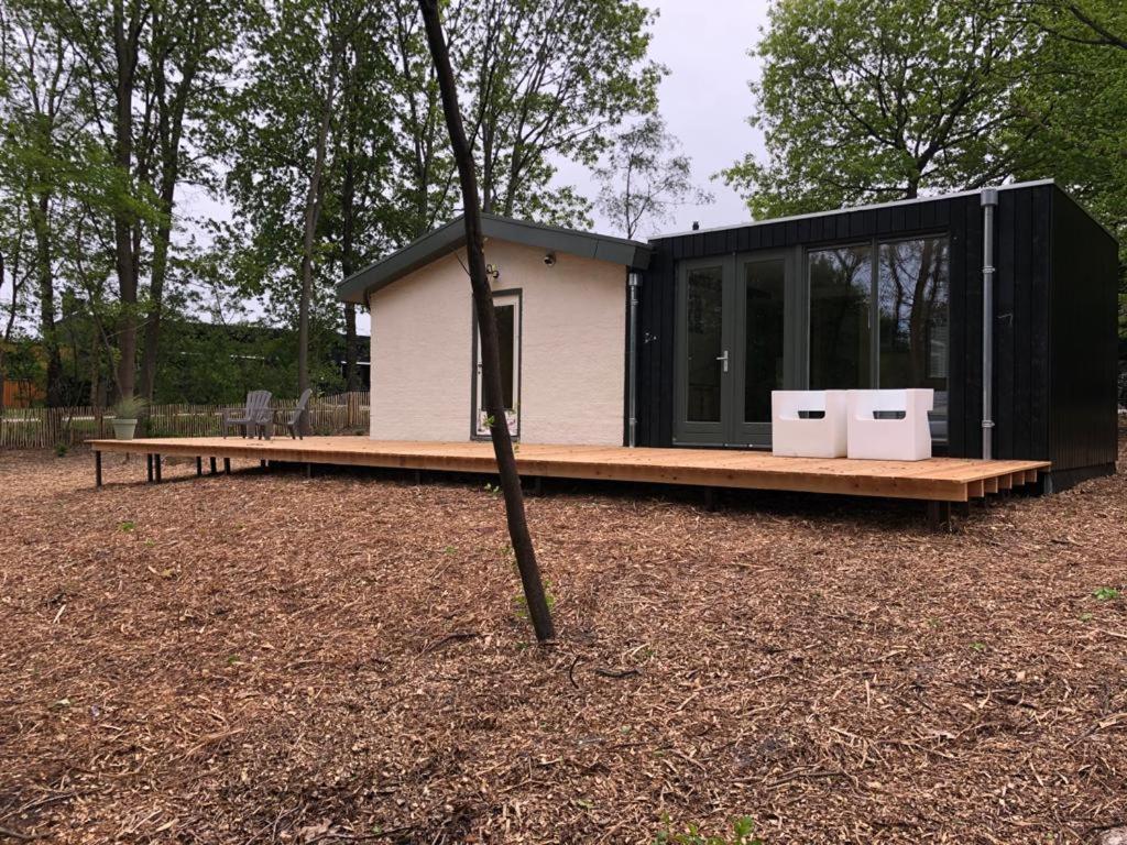 Stijlvolle bungalow nabij prachtige zwempoel - Housity