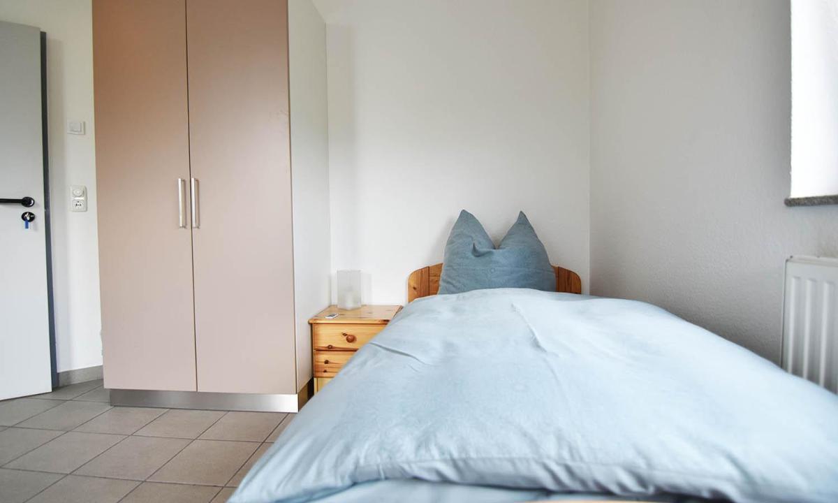 Monteurzimmer mit TV und WLAN, geteiltes Gemeinschaftsbad - Housity
