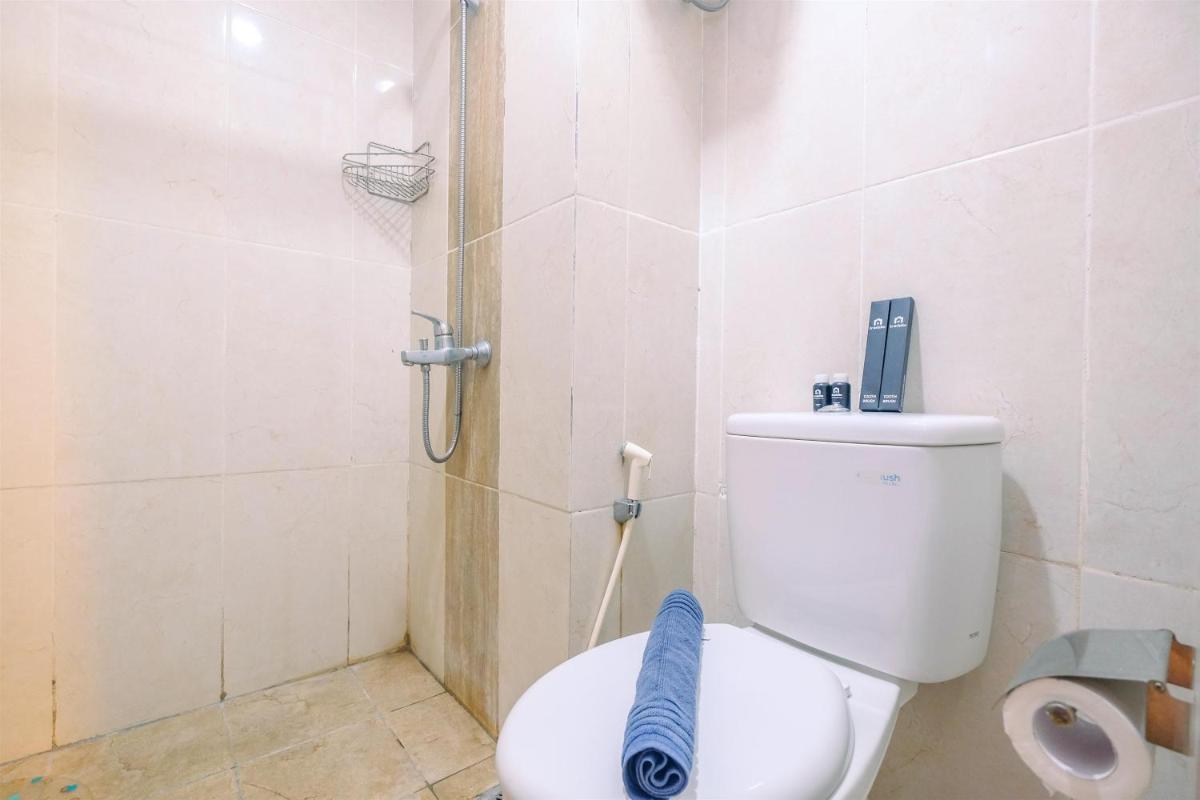 Cozy Living Studio Apartment Taman Melati Margonda near Universitas Indonesia By Travelio - Housity