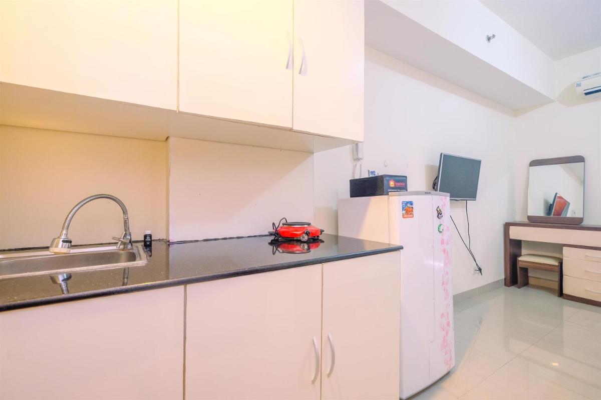 Cozy Living Studio Apartment Taman Melati Margonda near Universitas Indonesia By Travelio - Housity