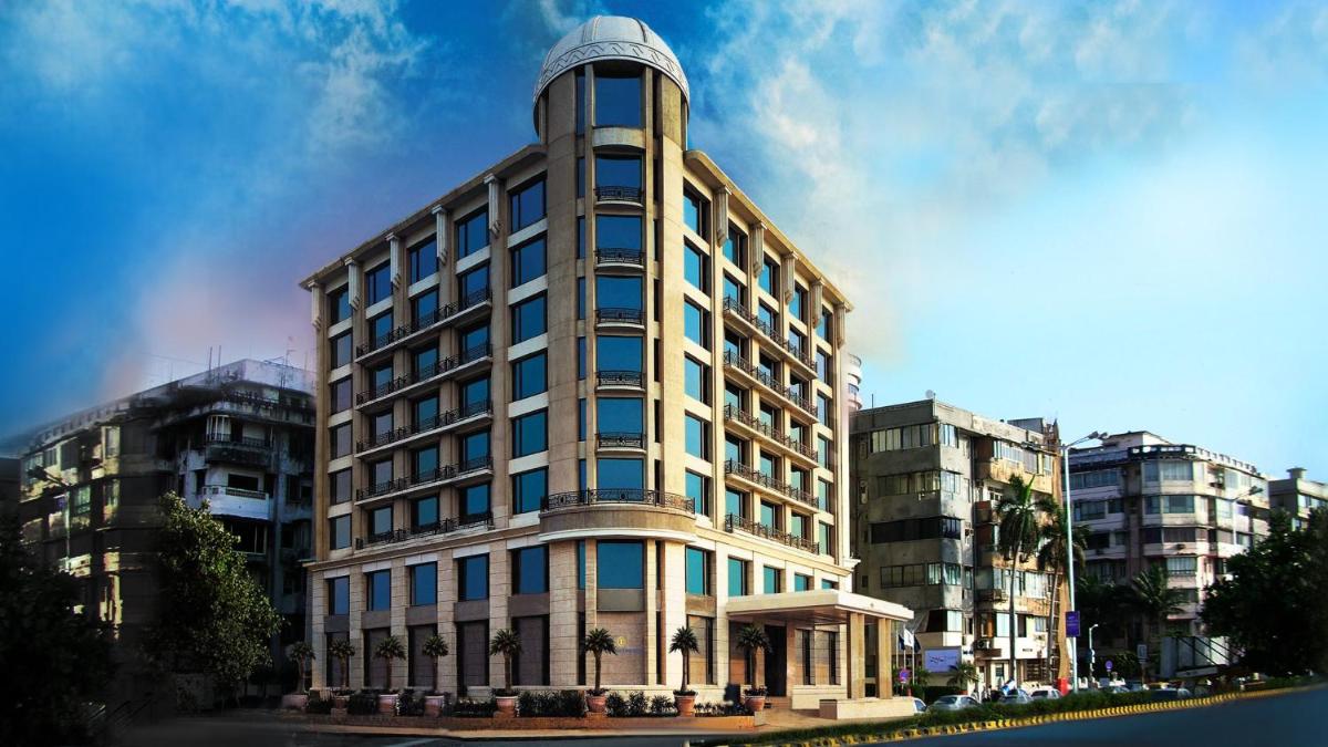 a tall building with a dome on top of it at InterContinental Marine Drive Mumbai by IHG in Mumbai