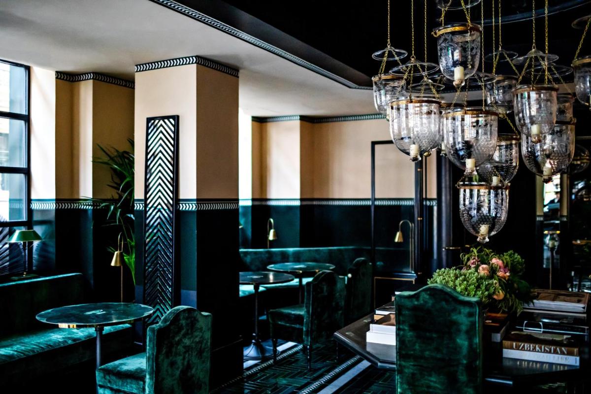 Coin salon dans l'établissement Monsieur George Hotel & Spa - Champs-Elysées