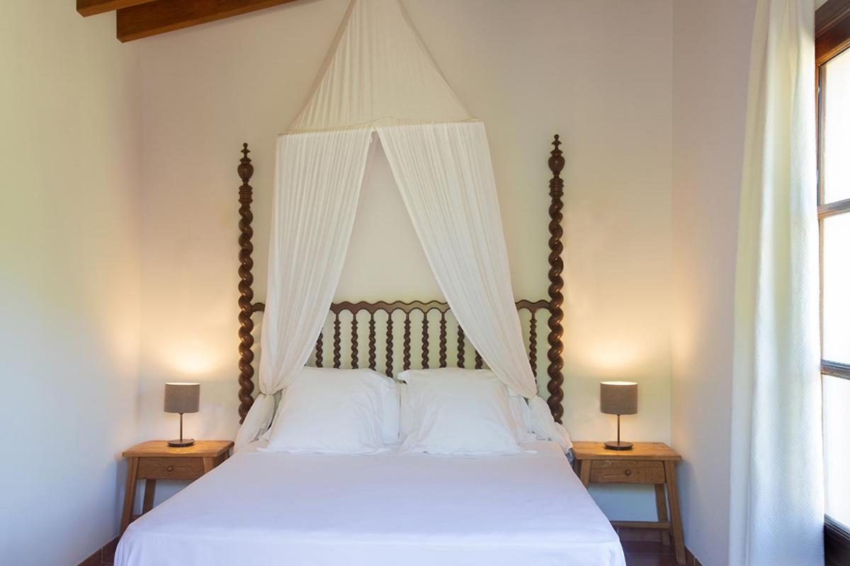 Cama o camas de una habitación en Hotel Es Port