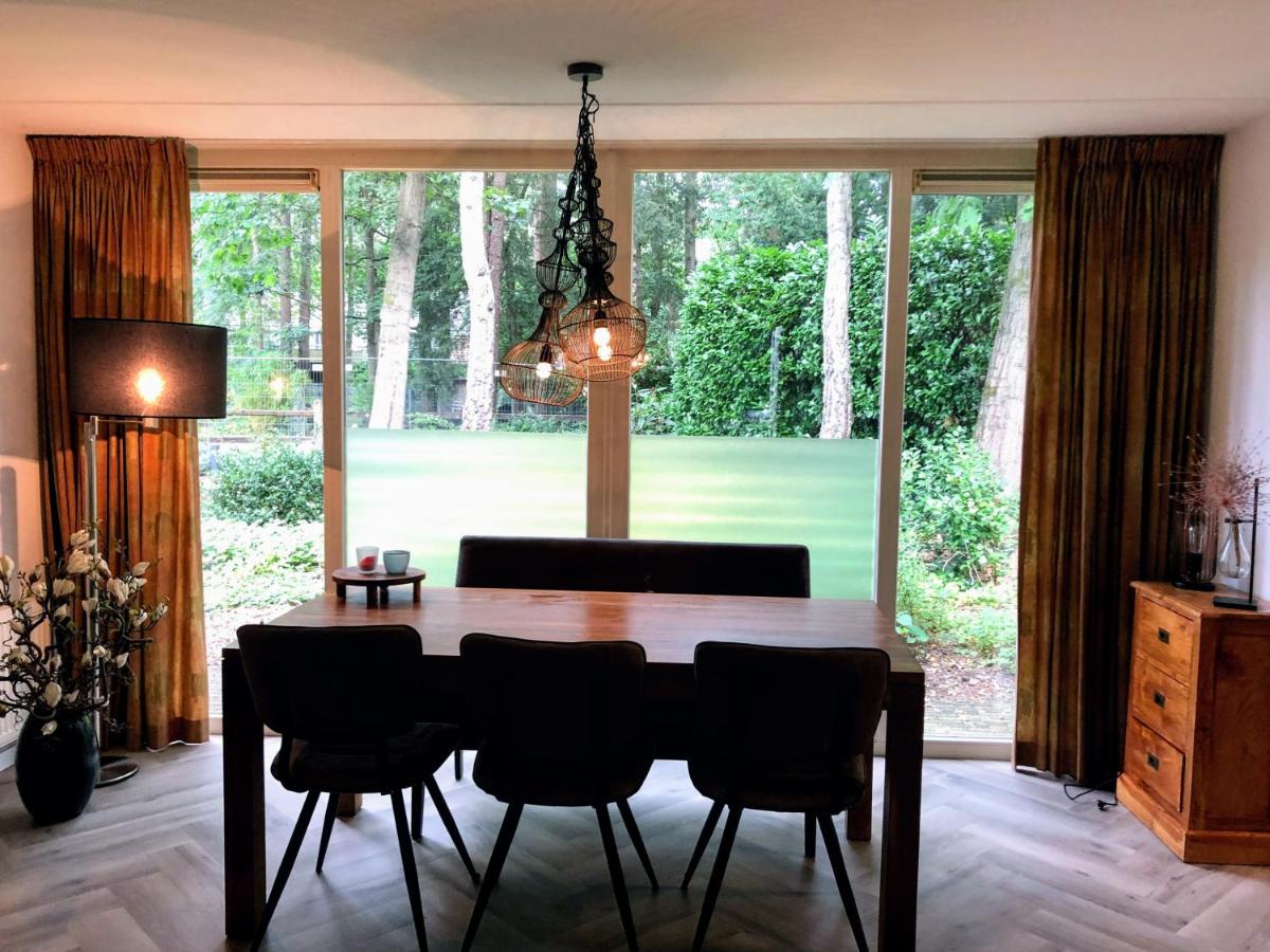 Bungalow met uitzicht op eigen bos - Housity