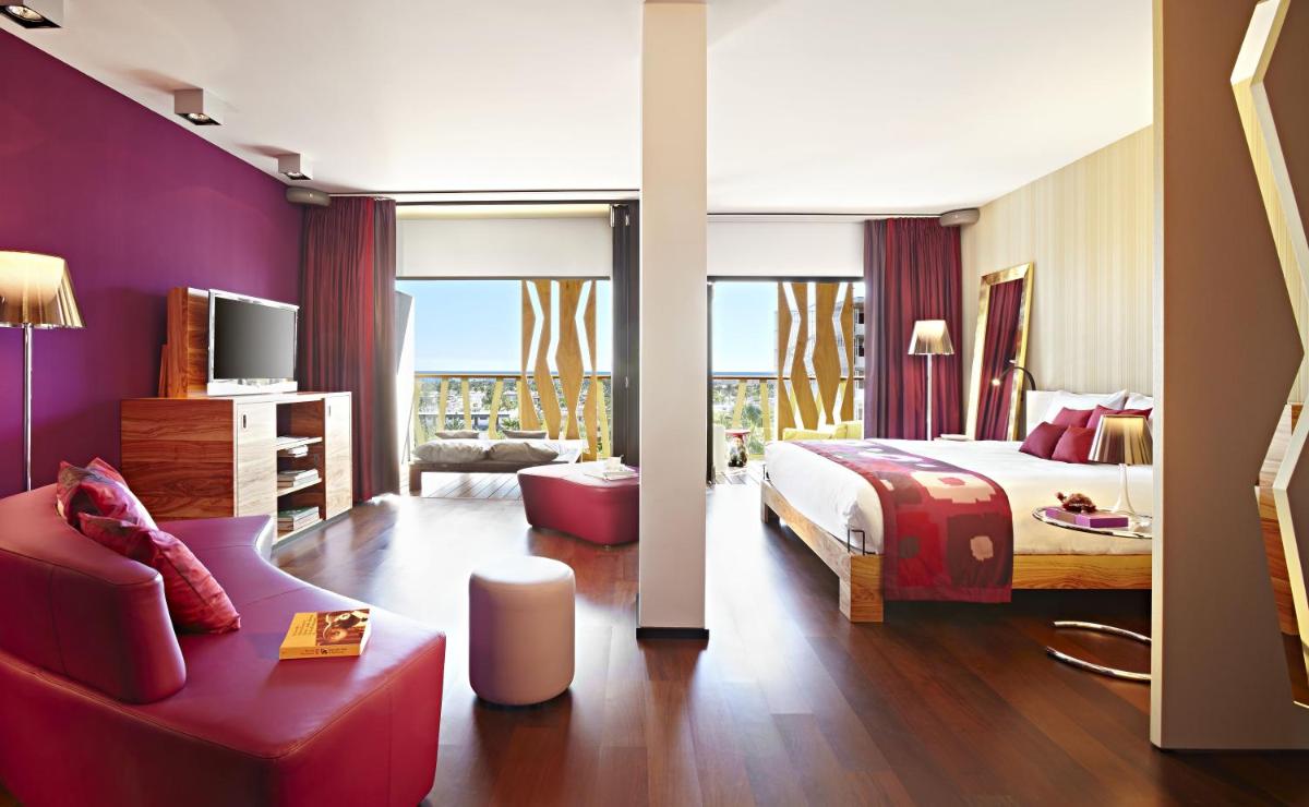 Cama o camas de una habitación en Bohemia Suites & Spa - Adults Only