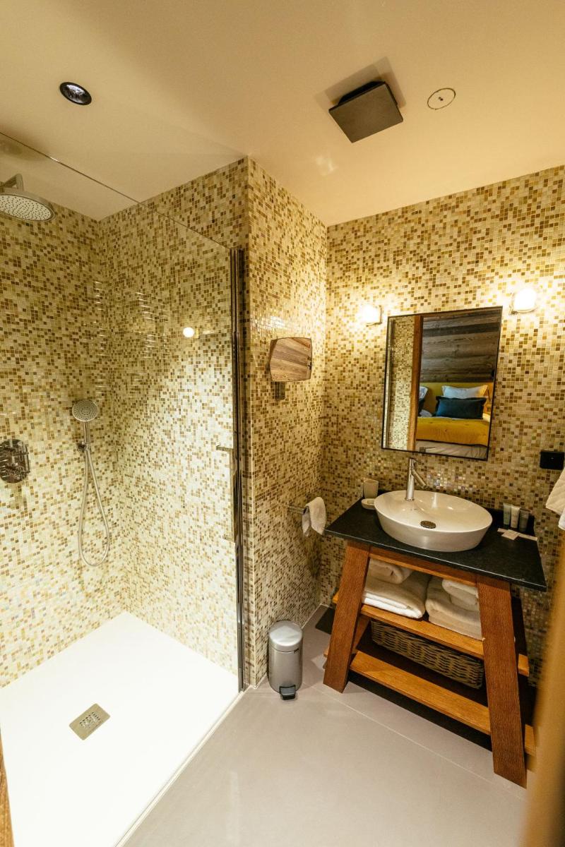 Salle de bains dans l'établissement Hotel Le V de Vaujany