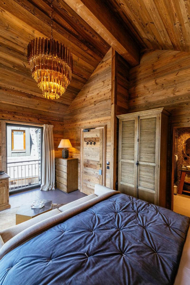 Un ou plusieurs lits dans un hébergement de l'établissement Hotel Le V de Vaujany