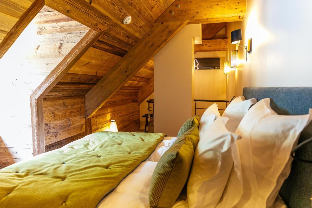 Coin salon dans l'établissement Hotel Le V de Vaujany