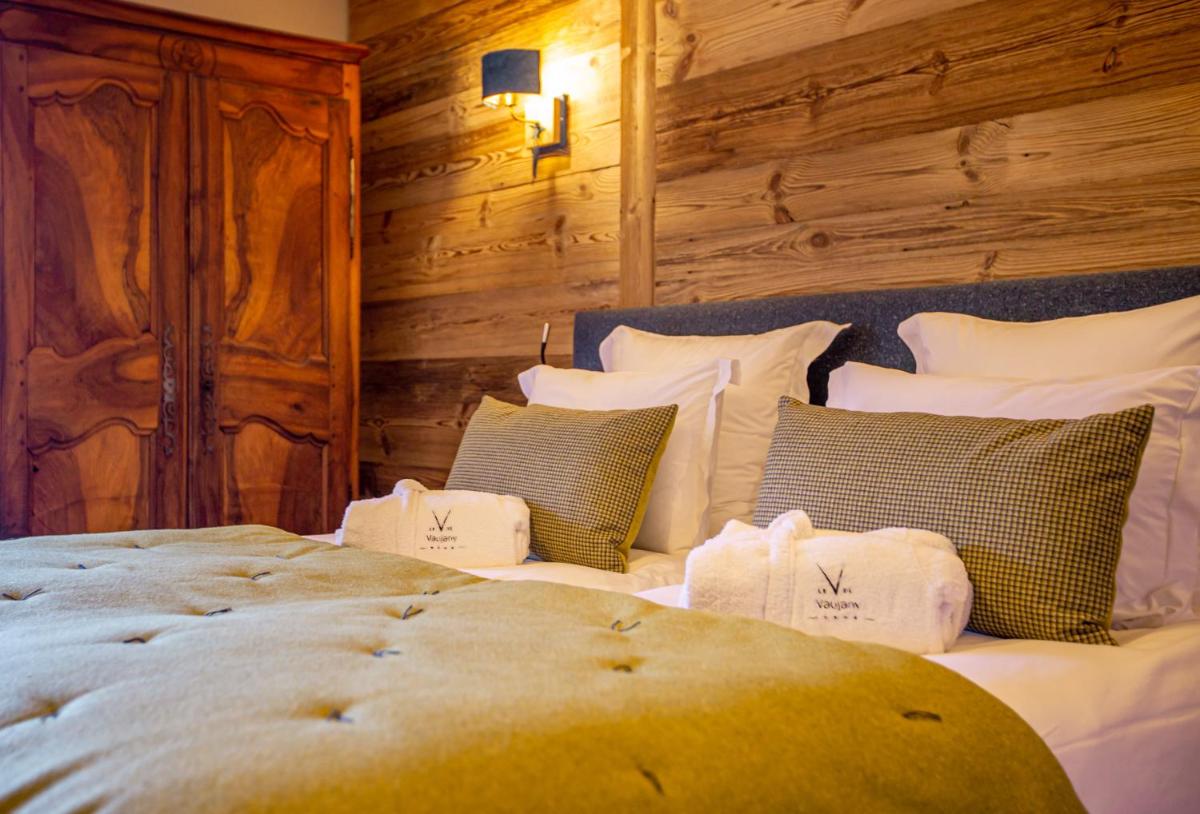 Un ou plusieurs lits dans un hébergement de l'établissement Hotel Le V de Vaujany