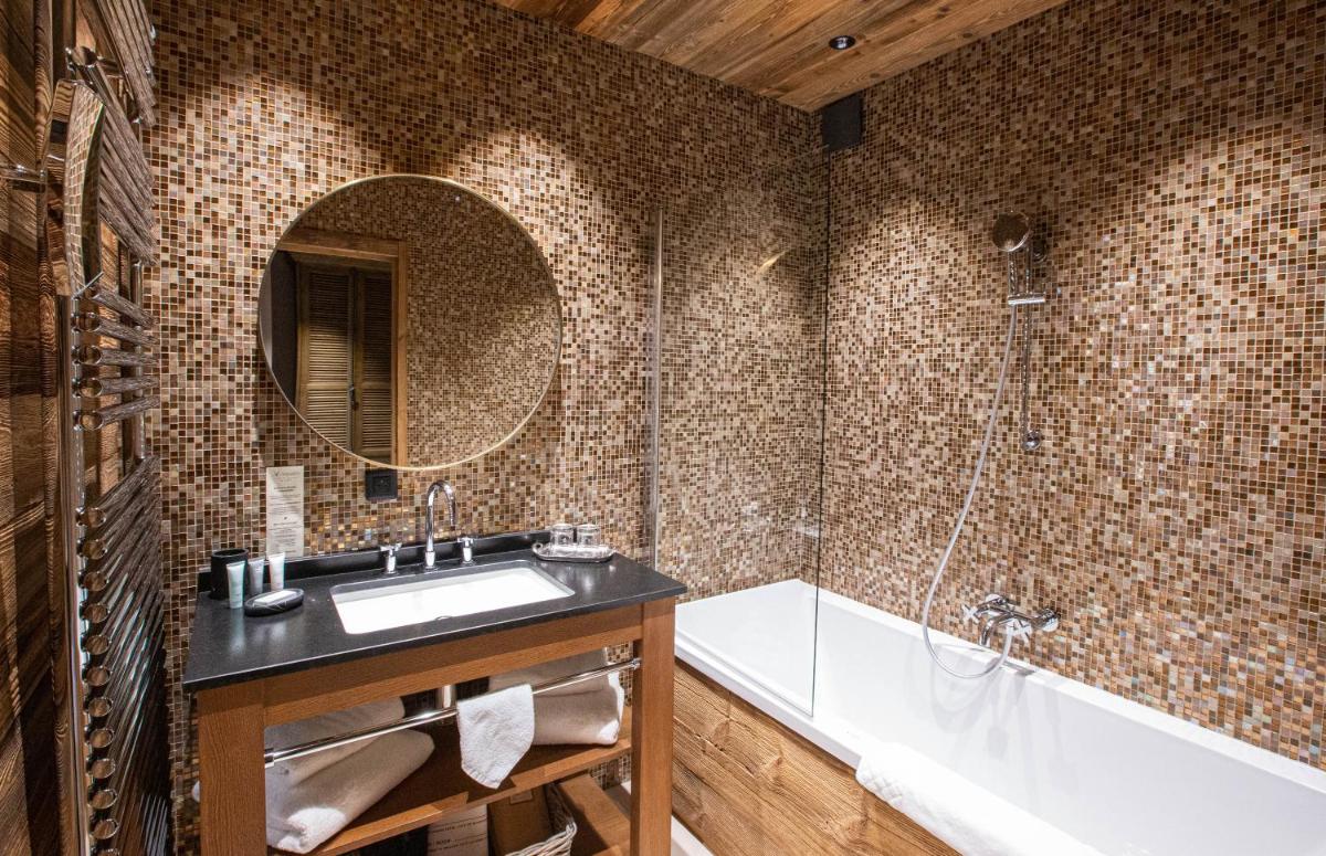 Salle de bains dans l'établissement Hotel Le V de Vaujany