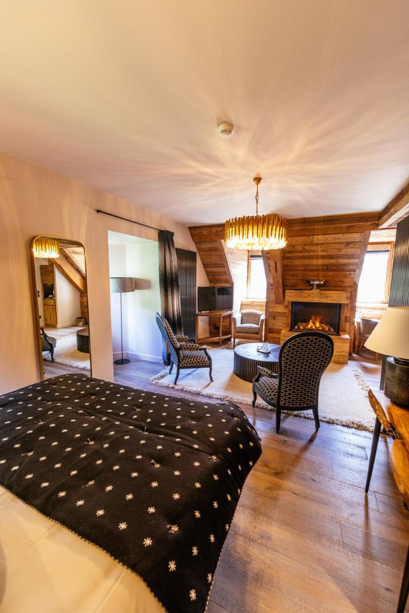 Coin salon dans l'établissement Hotel Le V de Vaujany