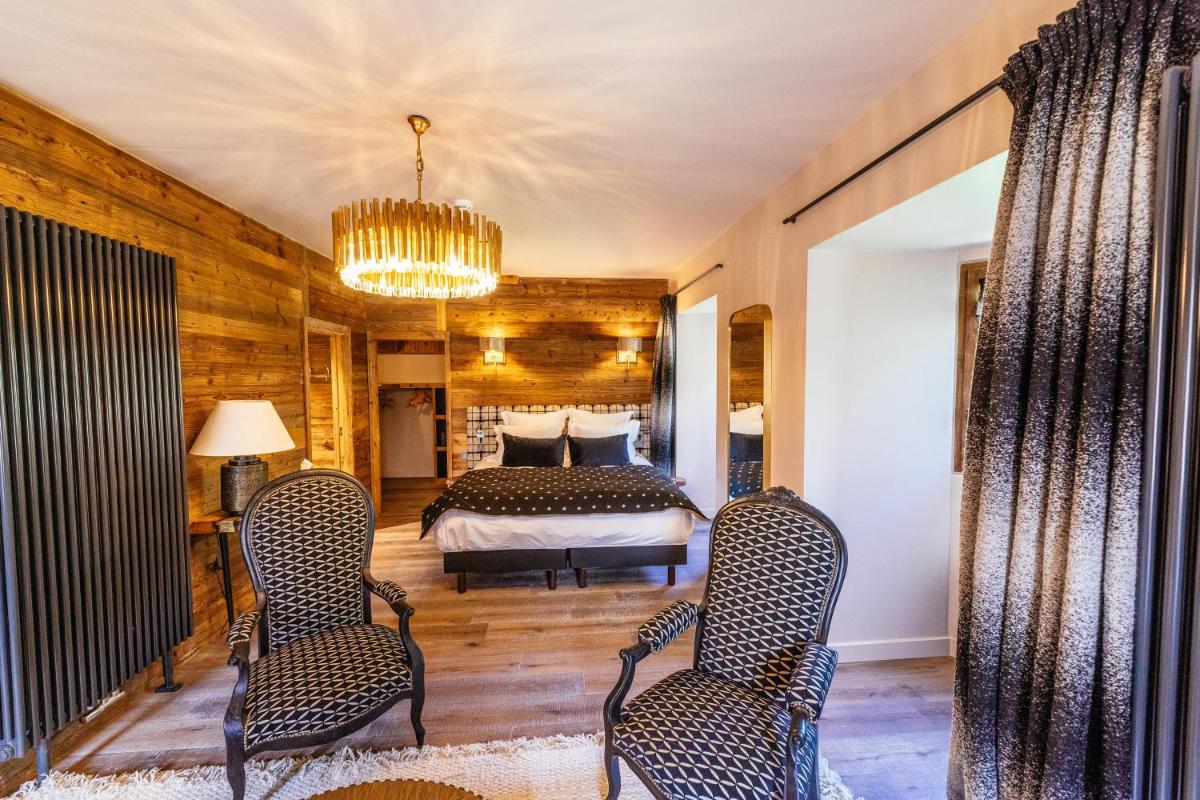 Coin salon dans l'établissement Hotel Le V de Vaujany