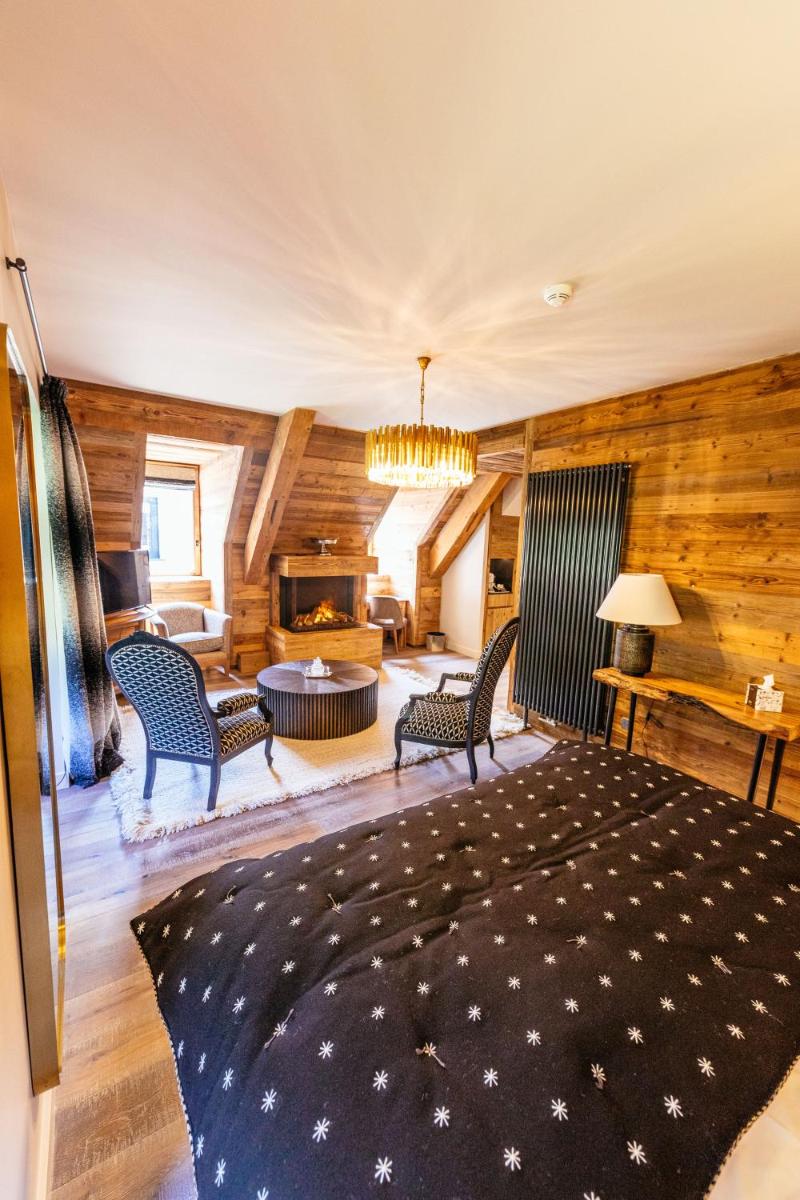 Coin salon dans l'établissement Hotel Le V de Vaujany