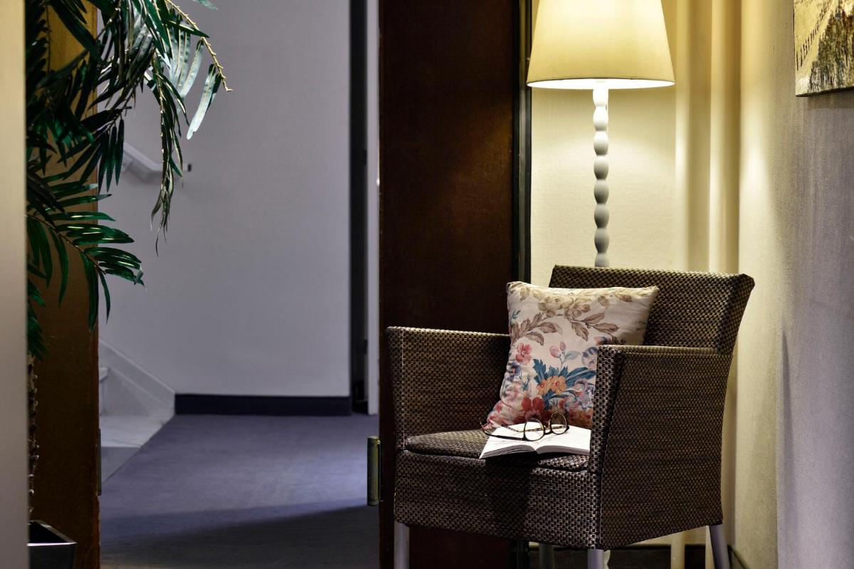 Coin salon dans l'établissement Hôtel Fesch & Spa