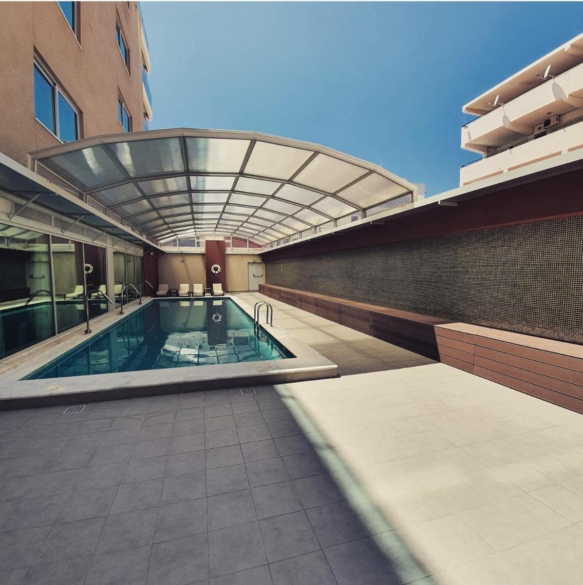 A piscina em ou perto de Monte Gordo Hotel Apartamentos & Spa