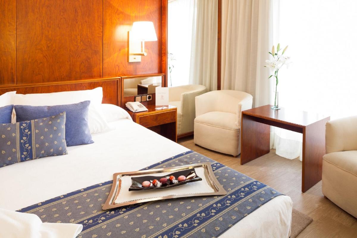 Cama o camas de una habitación en Hotel Royal Plaza